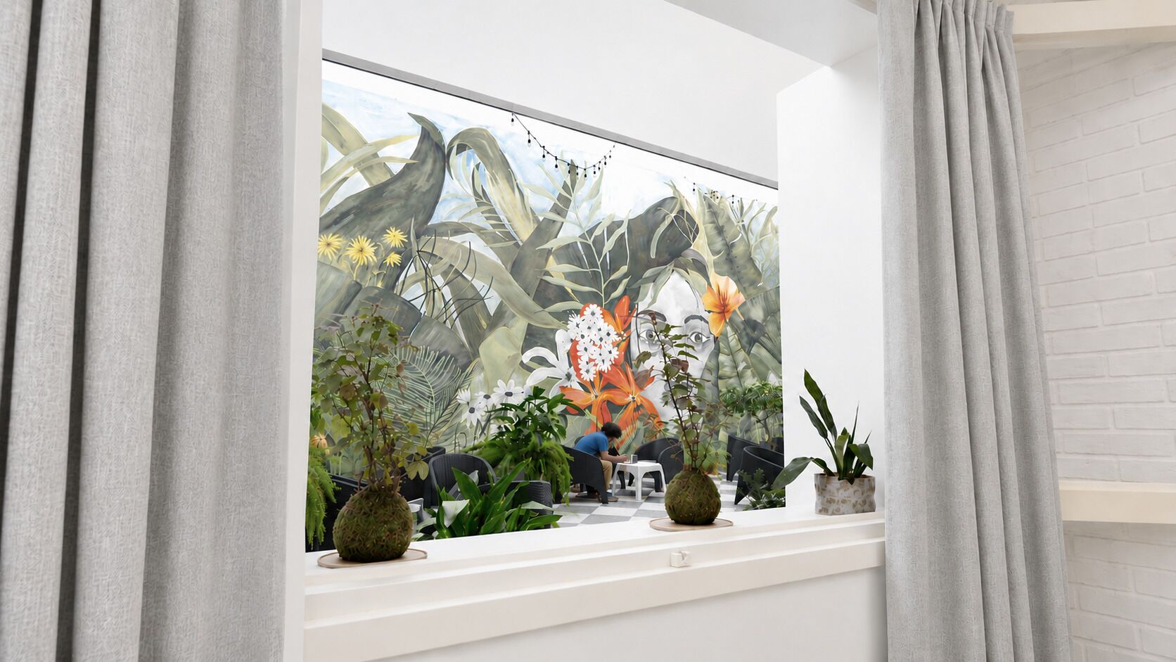 A room with a large window, a white brick wall, and a variety of potted plants on a shelf.