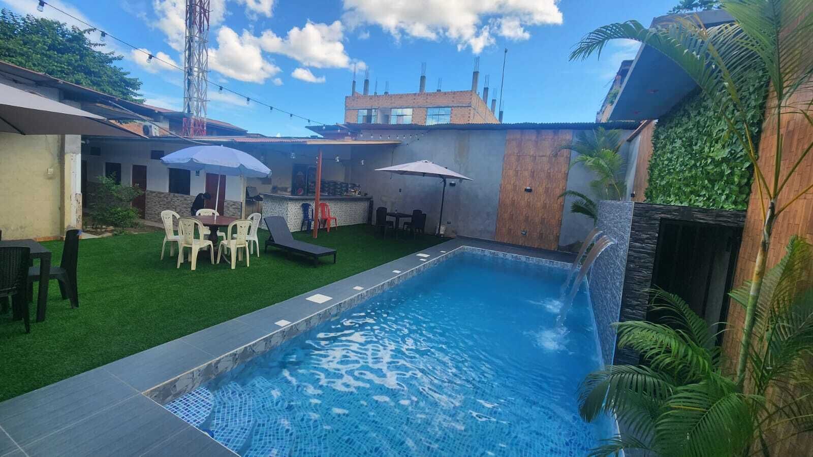 Outdoor pool, open 8:00 AM to 10:00 PM, pool umbrellas, pool loungers