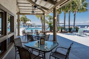 Outdoor dining - Sandestin Luau 1BR/1.5BA w/Gulf views and wraparound balcony steps from Beach! (Miramar Beach)
