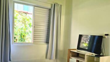 Basic Studio | In-room safe, laptop workspace, blackout curtains, iron/ironing board