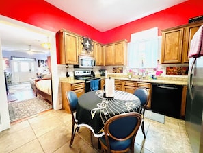Fridge, microwave, oven, stovetop - Unique, colorful, fun MidCity home with high ceilings, steps from the top cafés. (New Orleans)