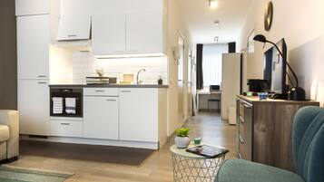 Comfort appartement | Privékeuken | Een koelkast, een kookplaat, een koffiezetapparaat/waterkoker