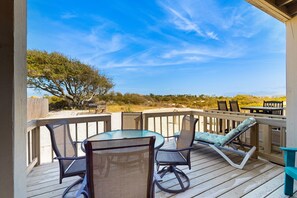 Outdoor dining - Adorable condo across from the Gulf with central AC, deck, pool & grill (Perdido Key)