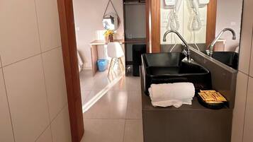 Superior Quadruple Room | Bathroom | Shower, hair dryer, towels, soap