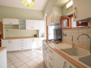 Fridge, microwave, oven, cookware/dishes/utensils