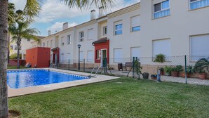 A residential building with a swimming pool, fenced yard, and potted plants. - Tigre - Jesus Pobre, Costa Blanca (Jesus Pobre)