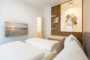 2 chambres, coffres-forts dans les chambres, Wi-Fi, draps fournis