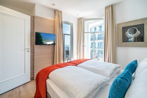 2 chambres, coffres-forts dans les chambres, Wi-Fi, draps fournis