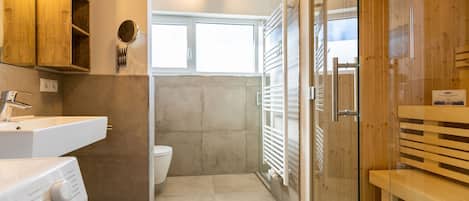 Shower, hair dryer, towels