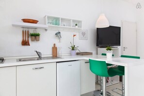 Fridge, stovetop, electric kettle, toaster