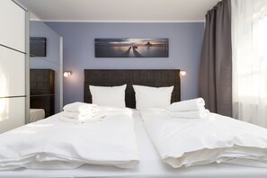 2 عدّة غرف نوم وواي فاي وملاءات أسرّة