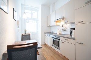 Fridge, oven, dishwasher, coffee/tea maker