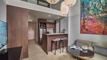 Executive-Loft | Wohnbereich | Flachbildfernseher
