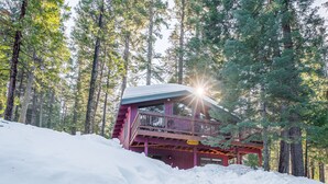 A cabin with a balcony, surrounded by trees and snow. - Sugar Pine Retreat - A/C & Pool Access (Camp Connell)