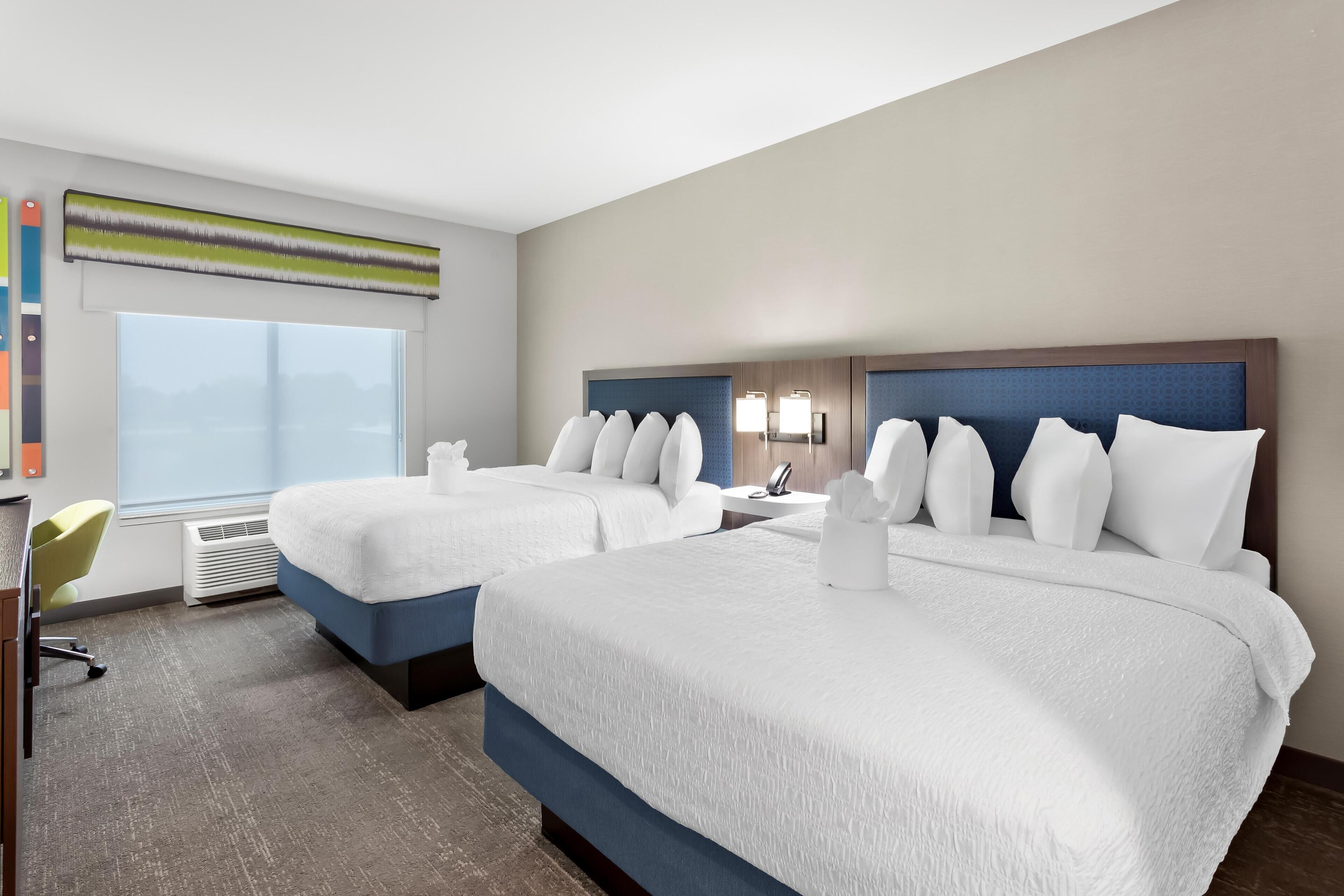 Desk, laptop workspace, blackout drapes, iron/ironing board