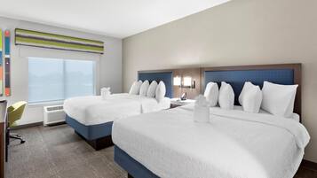 Desk, laptop workspace, blackout drapes, iron/ironing board