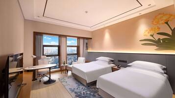 Deluxe Room, 2 Single Beds | Down duvets, in-room safe, individually furnished, desk