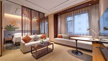 Deluxe Suite, 1 King Bed | Living area