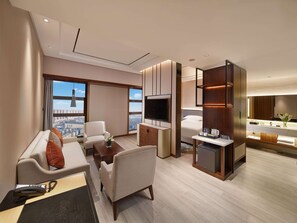 Suite Deluxe, 1 très grand lit | Couette en duvet d'oie, coffres-forts dans les chambres