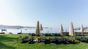 Private beach, sun-loungers, beach umbrellas, beach bar