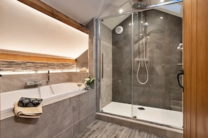 Bathtub, hair dryer, towels