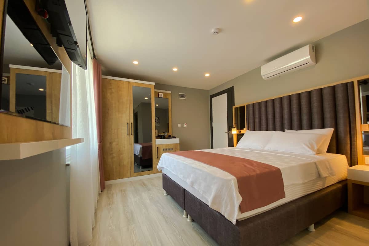 Premium bedding, free minibar items, individually decorated