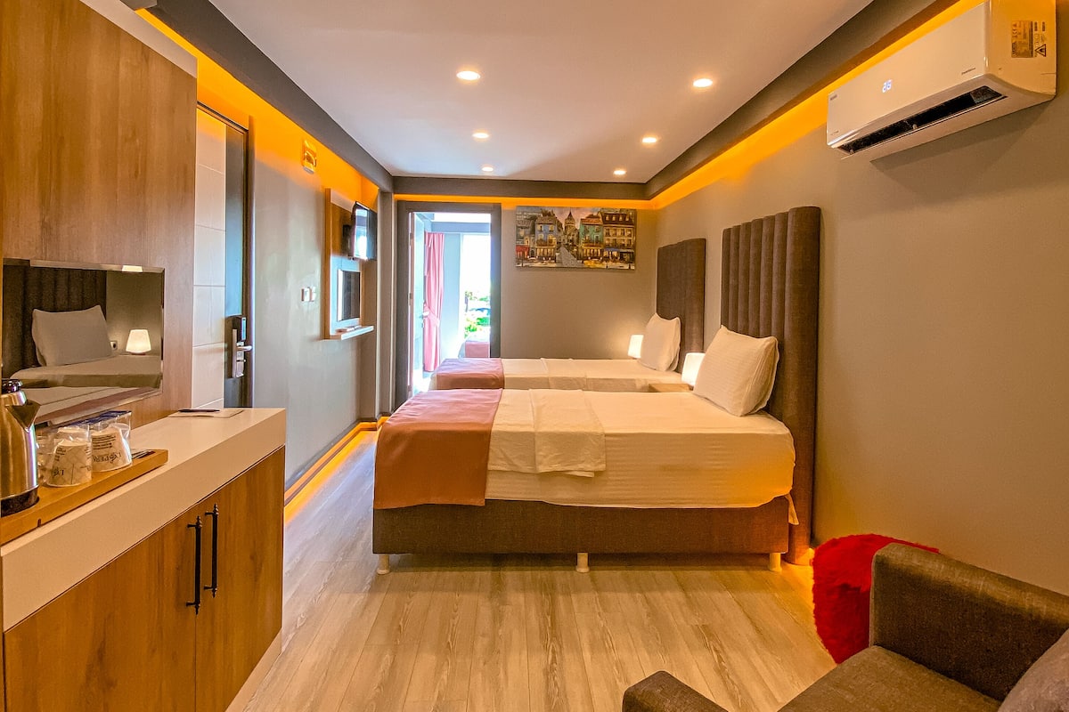 Family Suite, 2 Bedrooms, Non Smoking, Garden View | Premium bedding, free minibar items, individually decorated