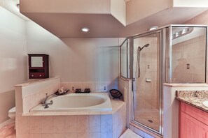 Combined shower/tub, hair dryer, towels, soap