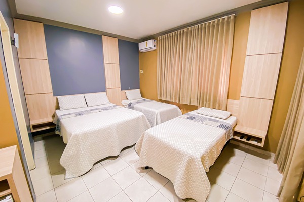 Basic Triple Room | Desk, laptop workspace, WiFi (free), bed sheets