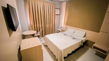 Desk, laptop workspace, free WiFi, bed sheets