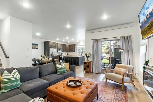 TV, fireplace, books, offices