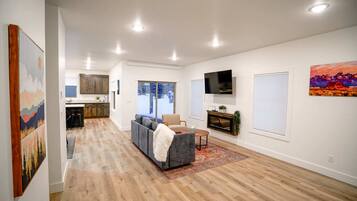 TV, fireplace, books, offices