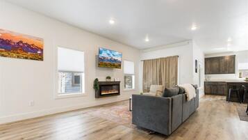 TV, fireplace, books, offices