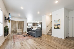 TV, fireplace, books, offices