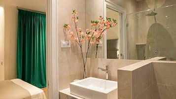 Shower, hair dryer, towels, toilet paper