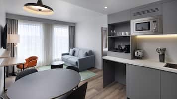 Suite, 1 Bedroom, Non Smoking | 1 bedroom, desk, laptop workspace, iron/ironing board