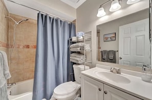 Combined shower/bathtub, hair dryer, towels, soap