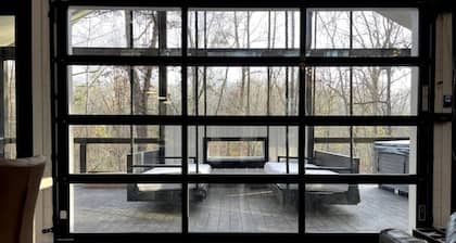 Modern Luxe has everything with HUGE back deck, jacuzzi, glam outdoor fireplace