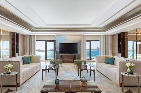 Presidential Suite Four Bedroom Sea View with Club Lounge Access | Living area | 50-inch Smart TV with cable channels, TV. Taj Exotica Resort & Spa, The Palm, Dubai