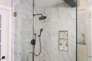 Combined shower/tub, hair dryer, towels, soap