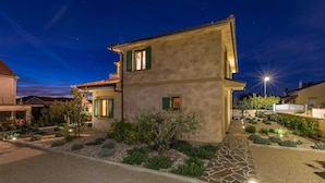 A two-story house with a stone pathway leading to the entrance, surrounded by landscaped gardens. - Rustic Villa BELLAMARE with pool (Linardići)