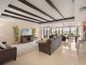 Stunning Spacious Luxury Condo 5\-Star Reserva Conchal | Living area | 60-inch Smart TV with cable channels, TV - Reserva Conchal Resort - Carao Complex (Cabo Velas)