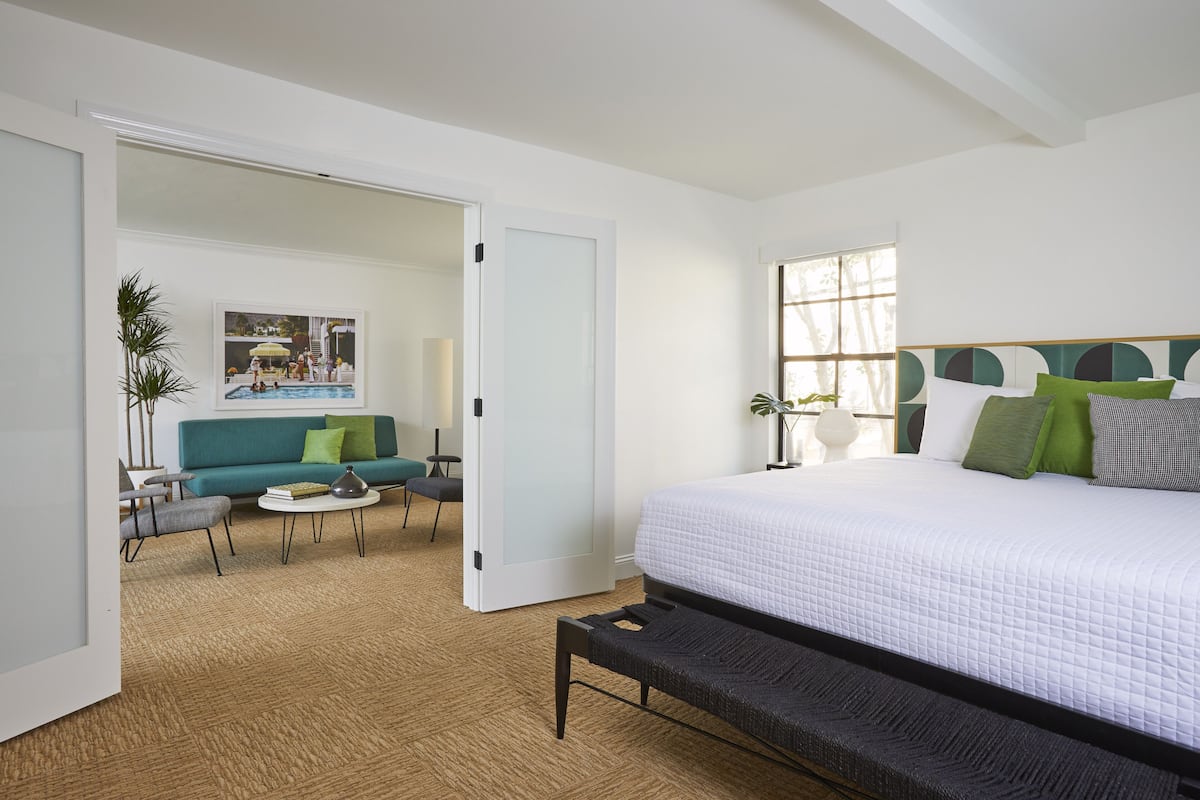 Deluxe Balcony Suite | 1 bedroom, in-room safe, desk, iron/ironing board