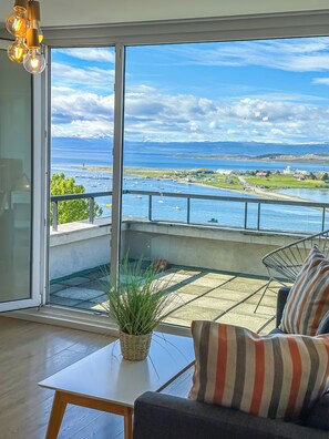 Studio, 1 Queen Bed, Balcony, Canal View | Living area | 43-inch Smart TV with cable channels, TV