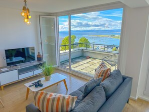 Studio, 1 Queen Bed, Balcony, Canal View | Living area | 43-inch Smart TV with cable channels, TV