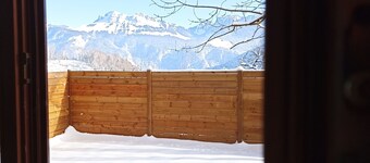 Old farmhouse, mountain view