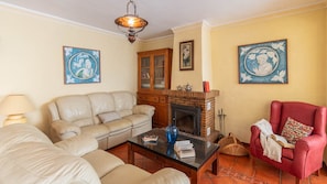 TV, fireplace - Villa Jorge Nerja by Ruralidays (Málaga)