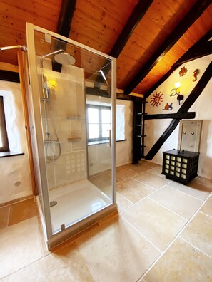 Shower, hair dryer, towels, soap