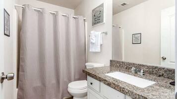 Shower, hair dryer, shampoo