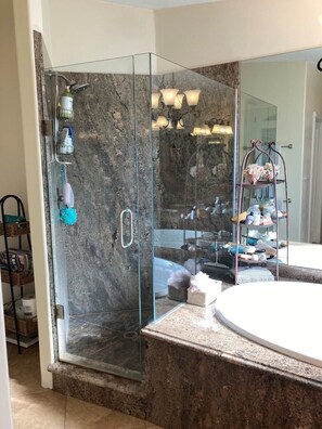 Combined shower/tub, hair dryer, towels, soap